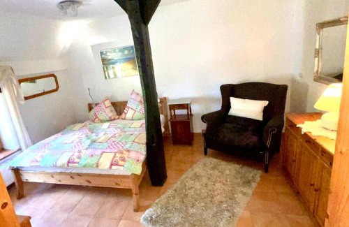 Hemmoor Apartment | Altes Landhaus Oste, Klavier Appartement, 2 Zimmer mit Kamin