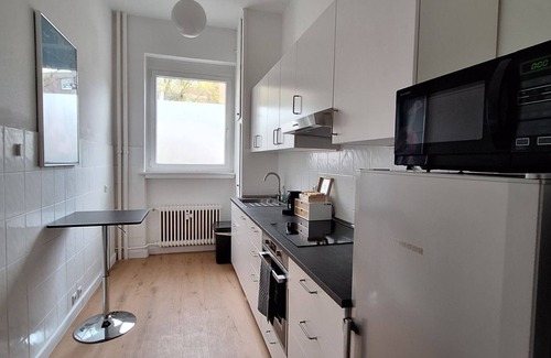 Braunschweig City Center Apartment | Am Altstadtmarkt | near VW Halle | kitchen | SmartTV