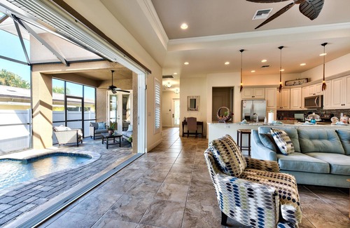 Naples Park House | Amalfi Vacation Rental: Stylish 3-BR Retreat Steps from Vanderbilt Beach. Relax by the Private Pool and Enjoy Modern Amenities. Ideal for Families with Easy Access to Mercato and Local Attractions