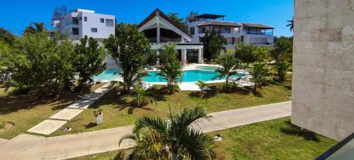 Las Terrenas Apartment | AMAR'E beach front apartment overlooking pool
