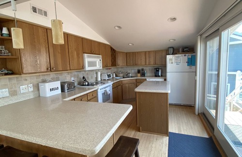 Harvey Cedars House | AMAZING LAGOON FRONT HOUSE WITH HEATED POOL AND HOT TUB IN HARVEY CEDARS, LBI