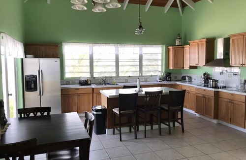 Estate Clairmont Villa | Amazing views from this Mid-Island Villa with swim up pool bar. 10% discount