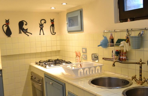 Corciano House | Ancient rock house with garden,situated in the centre,with view of Umbria