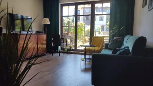 Piecki-Migowo Apartment | Apartament Tessa - sauna, ogród, kort tenisowy