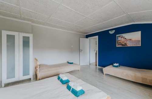 Karwia House | Apartamenty i pokoje na Złotej