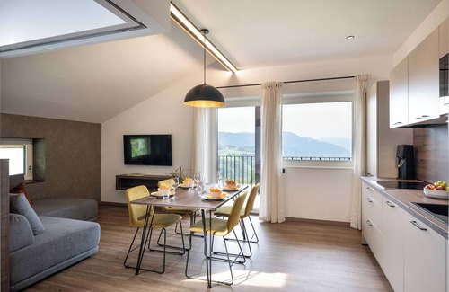 Fie allo Sciliar Apartment | Apartment 2 with a unique panoramic view surrounded by greenery