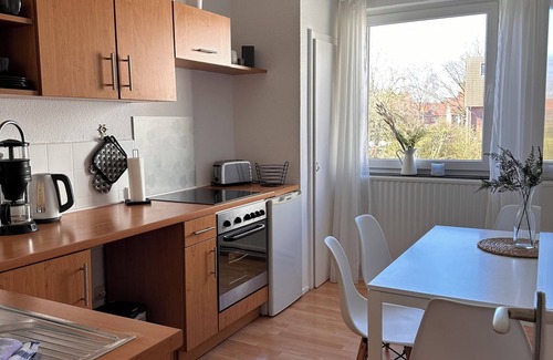 Heppens Apartment | Apartment 4 - Central but quiet, near the beach with optimal shopping opportunities