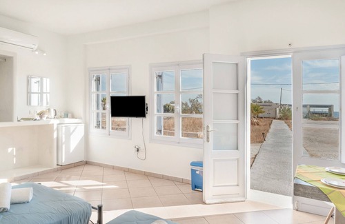 Perivolos House | Apartment "Aegean Blue Santorini Perivolos 1" with Sea View, Shared Terrace & Wi-Fi