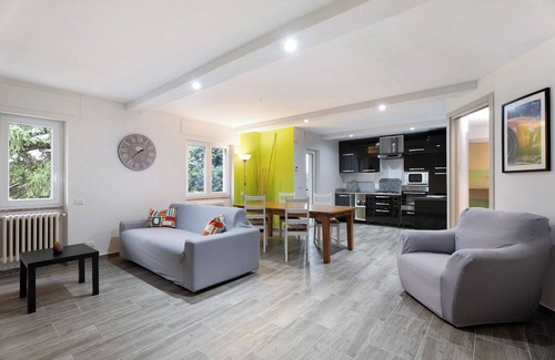 Arona Apartment | Apartment 'Bambù' with Private Garden, Balcony and Wi-Fi