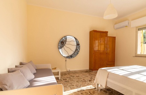 Sampieri Apartment | Apartment 'Carignano 94' with Private Terrace, Wi-Fi and Air Conditioning