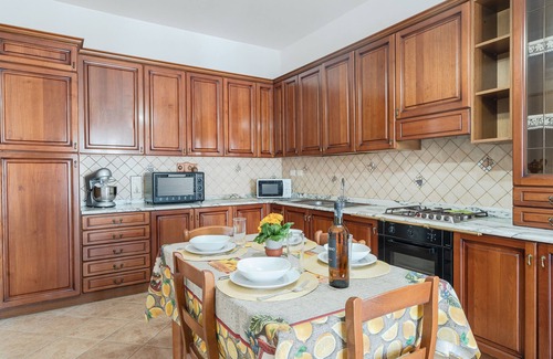 Punta Milocca Apartment | Apartment 'Casa Vivaldi Vista Giardino' with Sea View, Wi-Fi and Air Conditioning