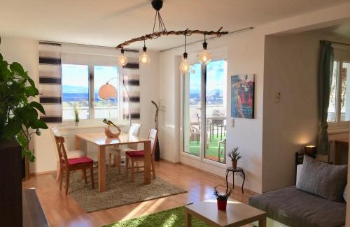 Oberschuetzen Apartment | Apartment Panoramablick mit Infrarotkabine auf der großen Terrasse und traumhaften Ausblick