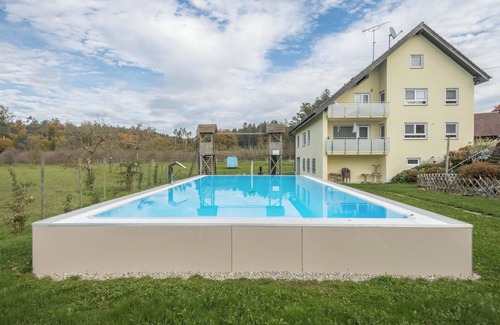 Tettnang Apartment | Apartment “Pfingstrose” on Farm close to Lake Constance with Wi-Fi, Garden & Pool