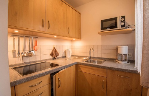 Kastelruth Apartment | Apartment “Trocker Kastelrut 12” near Seiser Alm with Balcony, Whirlpool & Sauna