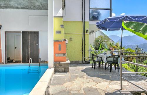 Agno Apartment | Apartment View And Pool - Happy Rentals