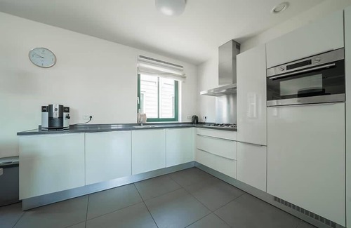 Uitdam House | Apartment with 5 bedrooms, a sauna and a balcony