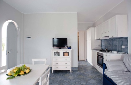 Villammare Apartment | Apartment with terrace. Shared pool. 150 metres from beach