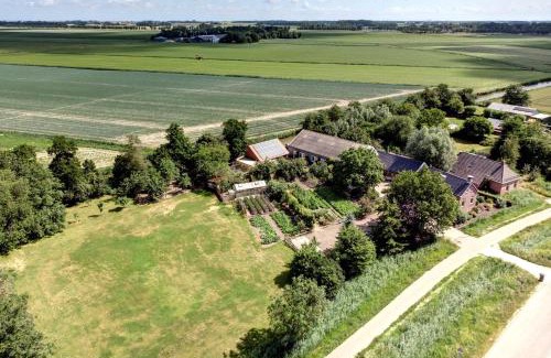 Baflo Bed & Breakfast | Appartement 3 met terras aan de tuin van Op de Roemte