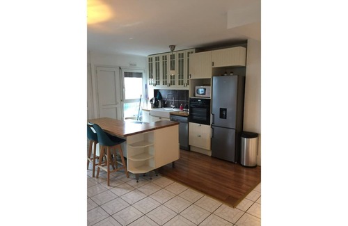 Quartier Centre Ville Apartment | Appartement Accueillant à une Demi-heure de Paris