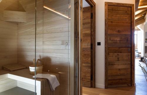 Courchevel Apartment | Appartement Contemporain avec Sauna, Cheminée et Parking au Centre de Courchevel 1850 - FR-1-564-35
