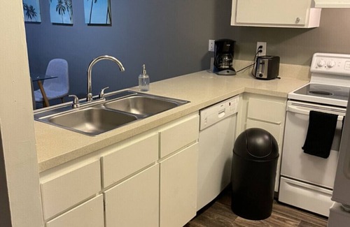 Historic Tennis Club Apartment | Apt D - furnished 2bed/2bath a block from Downtown PS with pool and fenced patio