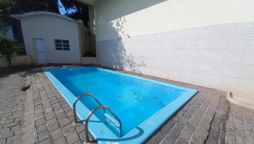 Porchat Island Apartment | Apto Vista Mar com Ar cond, Piscina, Wifi e Garagem