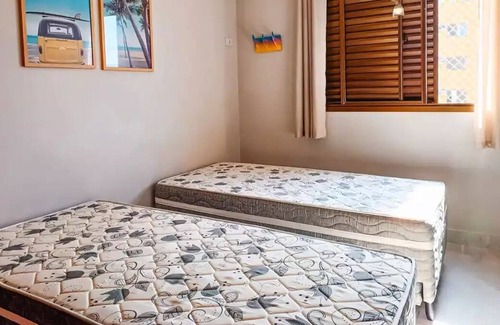 Jardim Belmar Apartment | Ar Condicionado Wi-fi Vaga Coberta Perto da Praia