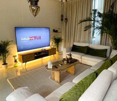 Nad Al Sheba Apartment | Arabian-Inspired 1BR - Polo Residence Near Burj