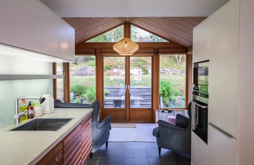 Hjaelteby Ski Chalet | Architect-designed villa with pool, sauna and sea view in Mjörn | SE09124