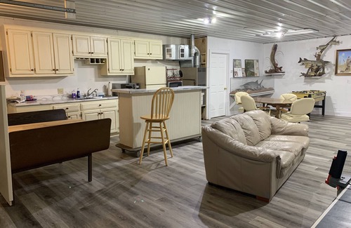 Madison Lake House | ARTISTS & ANGLERS INN - game room - home of Madison Lake Paddlefish!