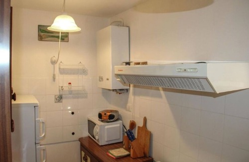 Roccascalegna House | At the Oven Door