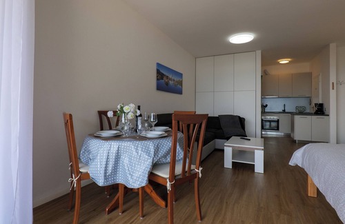 Susello Apartment | Attractive studio with balcony, pool and dream view