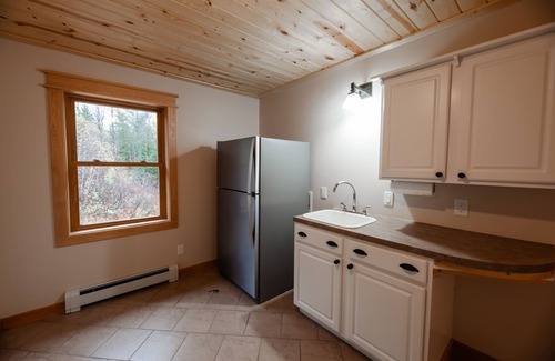 Champion House | ATV-Snowmobile Trail, Large home, sits on the peshekee river. sleeps 18 people.