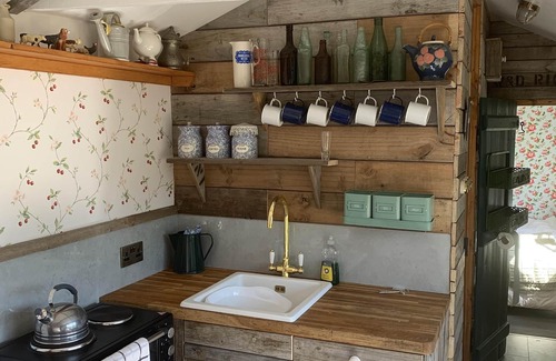 Sittingbourne Cabin | Authentic 1940's themed wooden cabin.
