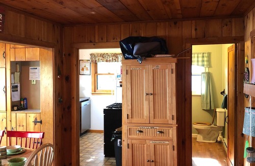 Warren County Cabin | Authentic seasonal 1950’s Adirondack live edge /knotty Pine waterfront cabin.