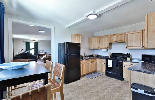 Abilene House | Baby Grand Bungalow in the Historic Downtown SoDa District