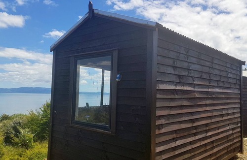 Waiomu Cabin | Bach with Stunning Sea Views in Conscious Community