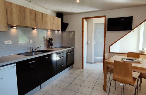 Villers-le-Lac Apartment | "Balcony overlooking the Doubs Basin and the Swiss village of Les Brenets