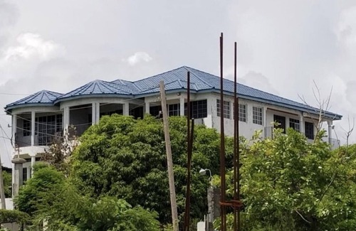 Spring Village Villa | Bayview Villa First & Only 7 Bedroom lodging with Seaview in Clarendon, Jamaica.