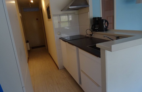 Hollum Apartment | Beach 1 km, on site resort with covered swimming pool, playground, tennis