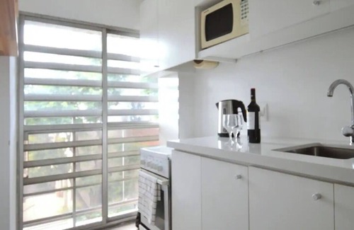 Pocitos Apartment | Beach and city in Montevideo.