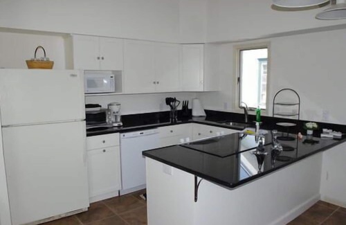 North End Condo | Beach block house on prime St. Charles street location with view of ocean