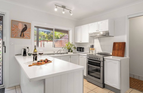 Emerald Beach House | Beach Cockatoo, Sleeps 4, start your day with a surf or walk on the beach