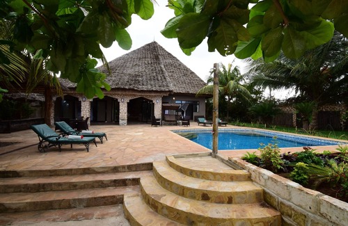 Matemwe Villa | Beach Front Private Villa with a pool, 4 bedroom