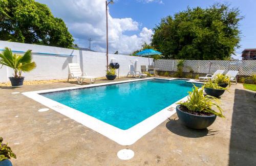 Bon Accord Village Apartment | Beach House In Crown Point- walk to the beach