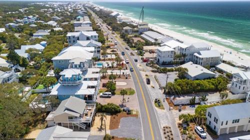 Seacrest House | Beach Retreat w Sundeck Golf Cart Bikes Bungalow House by AvantStay