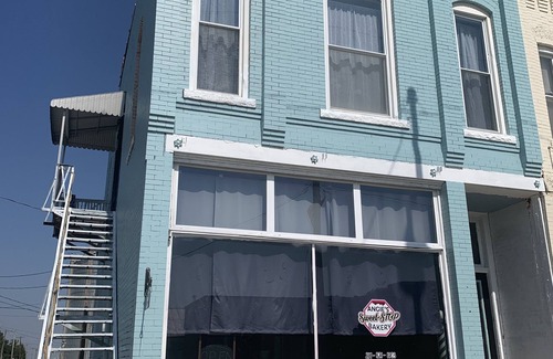 Assumption Apartment | Beach-themed rental with many activities within walking distance.