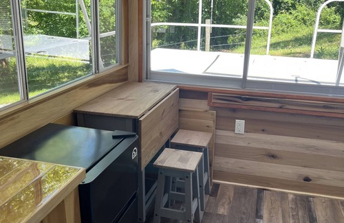 Langsville Boat Rental | Beached houseboat with lots of character and deck jacuzzi