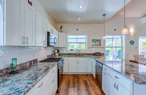 Hope Town House | Beachfront 4 bed 3 bath luxury home with dock access, Hope Town settlement area