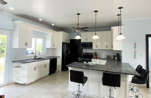 Caribbean Way Villa | Beachfront Home w/Pool, Volleyball & Rooftop View